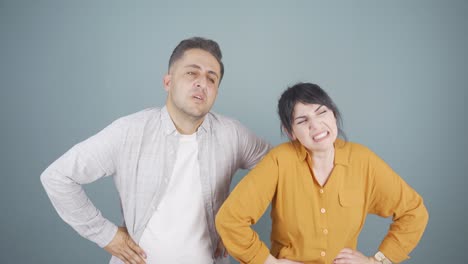 couple experiencing stomachache.