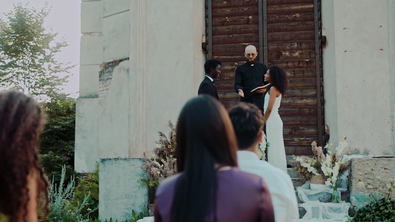 Wedding Ceremony with Bride, Groom, and Officiant