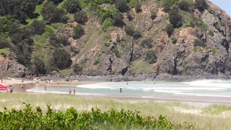 beachgoers enjoying a sunny day by the sea