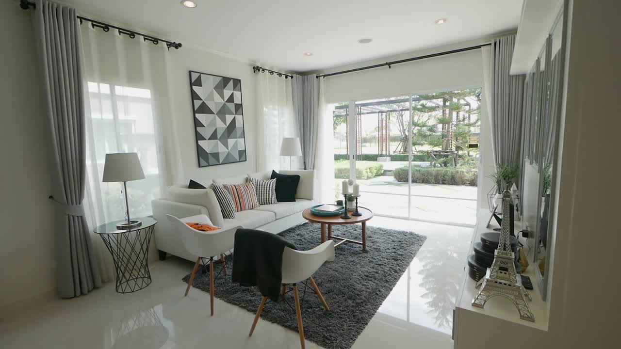 decoración de sala de estar luminosa y acogedora en la casa de planta abierta