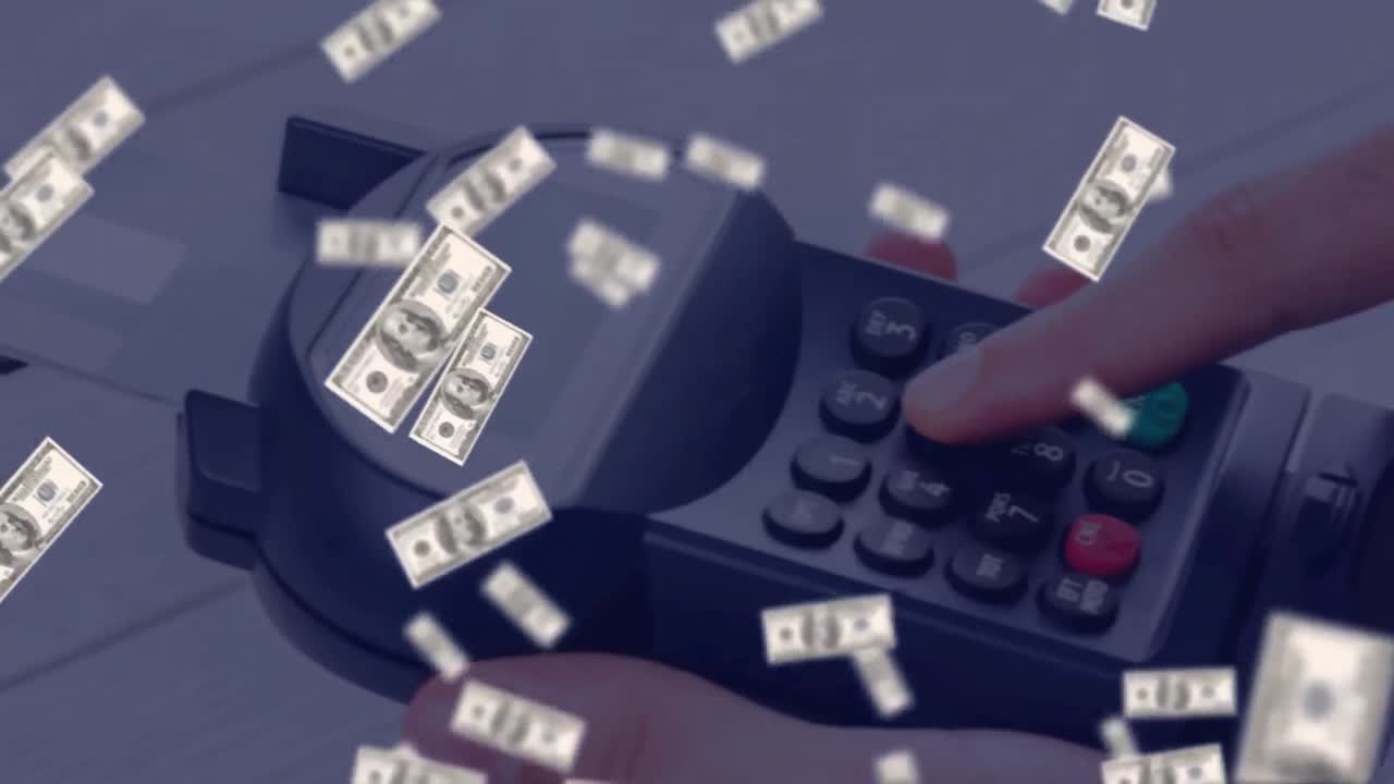 결제 터미널을 통해 떠다니는 달러의 애니메이션