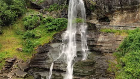 Steinsdalsfossen-is-a-waterfall-in-the-village-of-Steine-in-the-municipality-of-Kvam-in-Hordaland-county,-Norway.-The-waterfall-is-one-of-the-most-visited-tourist-sites-in-Norway.