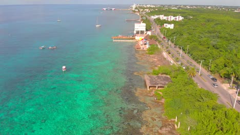 4k drone footage over shore road in cozumel mexico