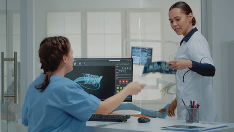 dentistry assistant using computer with virtual teeth animation