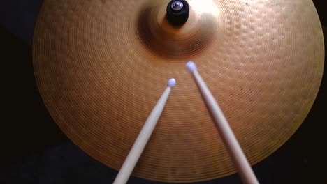 close up drummer playing on drum plate ride