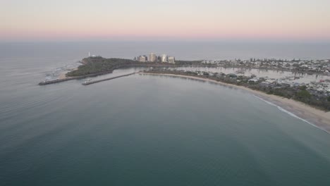 Calm,-Foamy-Waves-at-Rock-Wall-Point-Cartwright,-Mooloolaba,-Sunshine-Coast,-Queensland,-Australia-Aerial-Drone-Shot