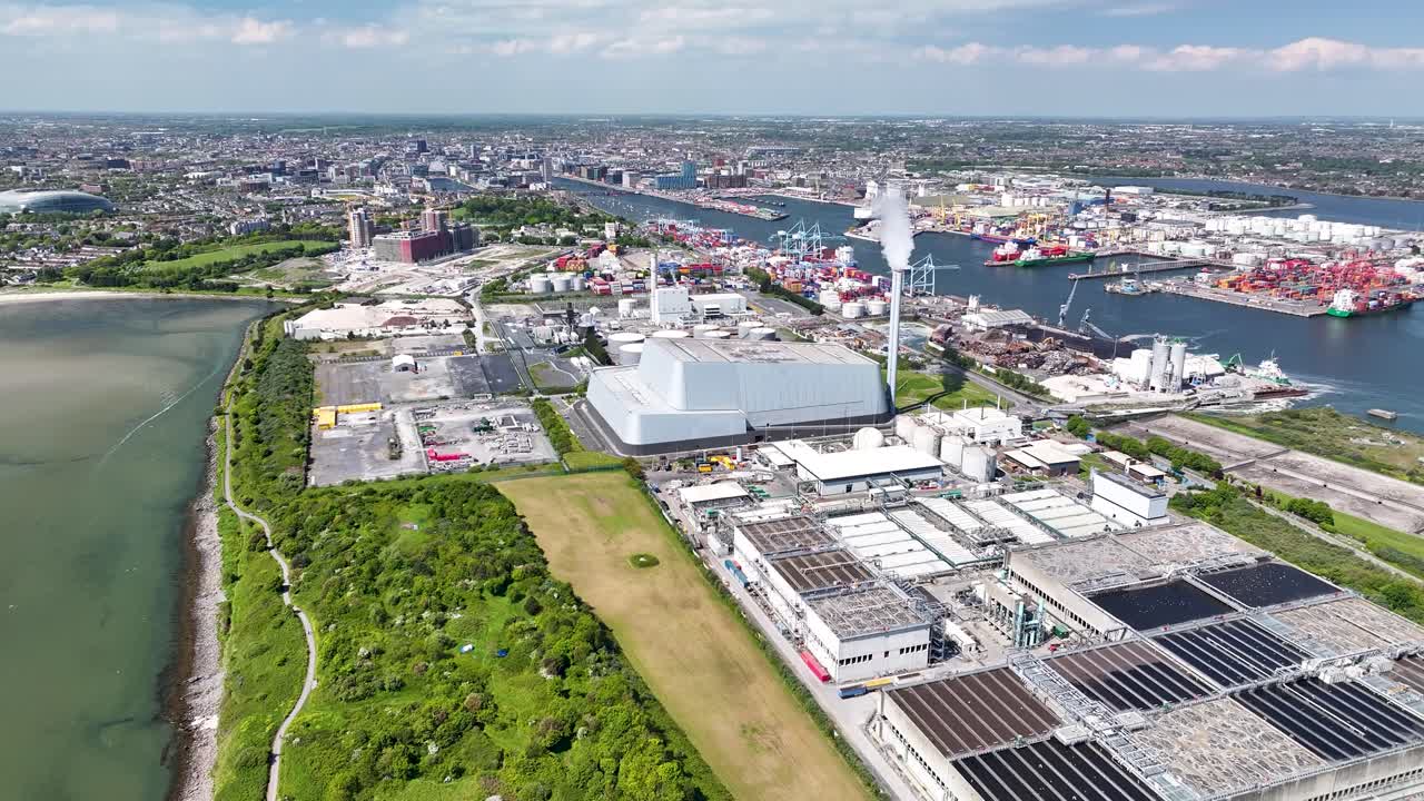 Dublin Covanta Plant. Industrial zone in Irelands capital, docks and wide cityscape. Sunny