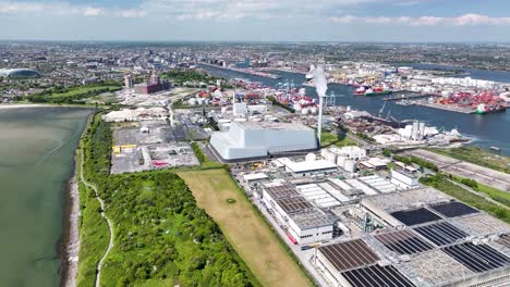 dublin covanta plant. industrial zone in irelands capital, docks and wide cityscape. sunny