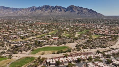 tucson arizona aerial v5 flyover oro valley canada hills neighborhoods capturing spectacular mountainscape, el conquistador golf course and tennis courts - shot with mavic 3 cine - march 2022