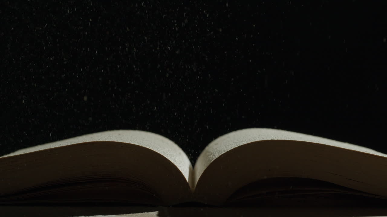 Open Book with Particles