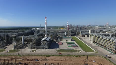 An-aerial-view-of-a-large-piping-system-of-an-oil-refinery