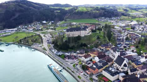 beautiful drone shot of the village "grein" in austria