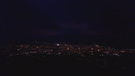panoramic night view of cluj napoca city by drone