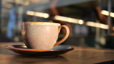 coffee cup on a wooden table