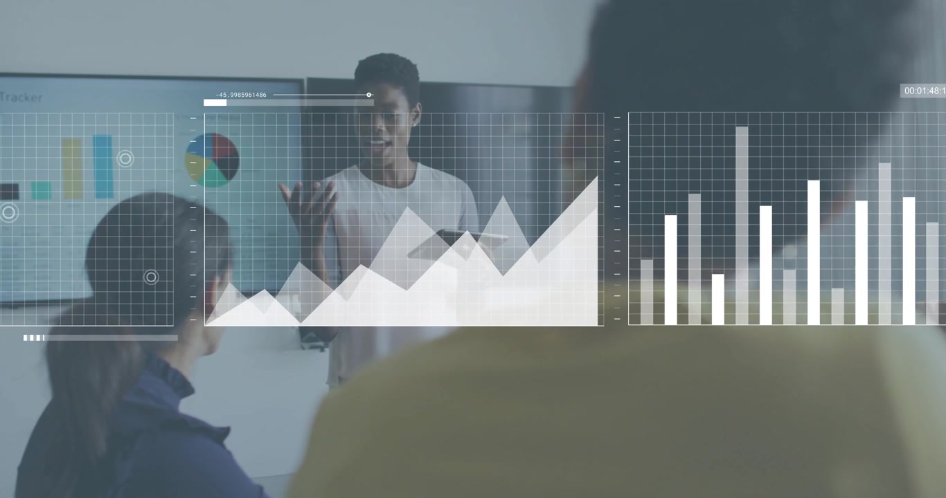 Presenter glancing tablet animating graphs and map tracking business trends with colleagues nodding