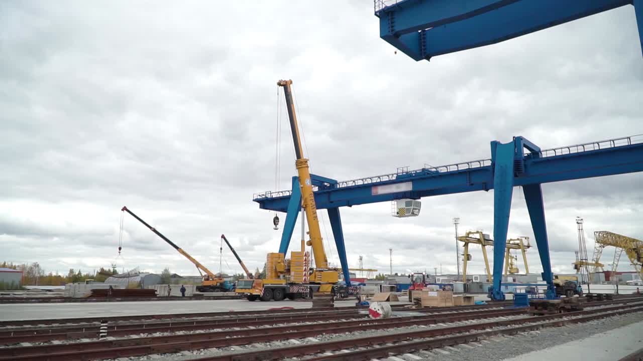 Industrial Site with Cranes and Heavy Machinery