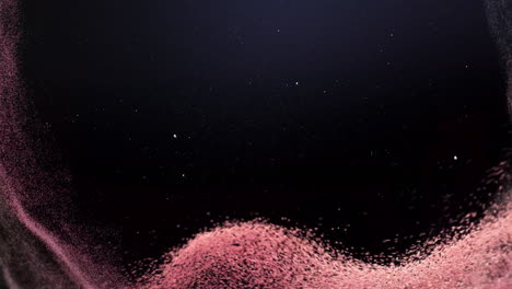 forming pink landscape, particles animating over dark background