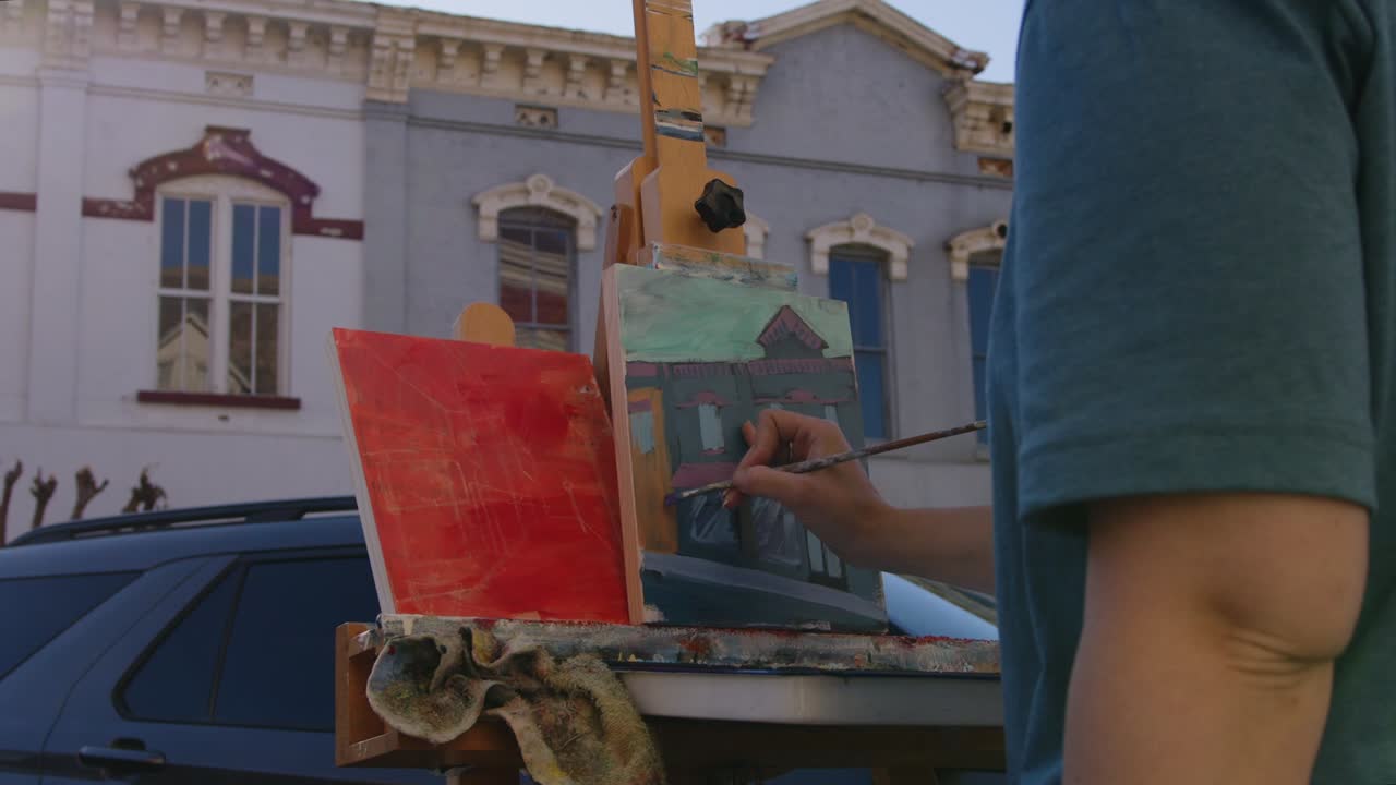 Americus First Friday Art Event Sumter County Georgia artist painting local street scenes of buildings