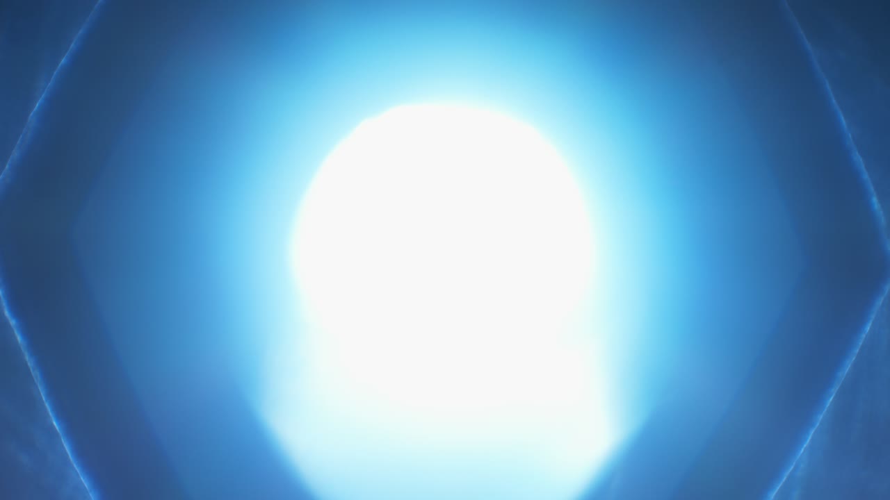 Iris blades slowly closing with blue light shining through old camera lens, fade in from white