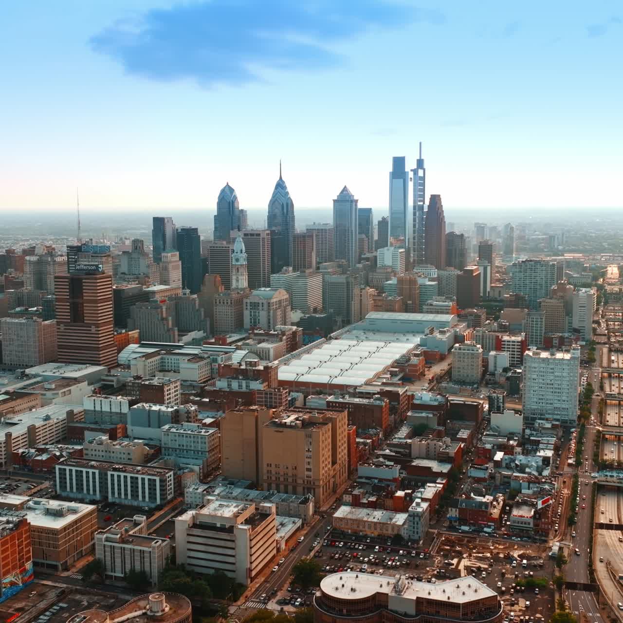 Going up over the stunning panorama of Philadelphia, USA. Skyscrapers of downtown standing out in the cityscape. Aerial view