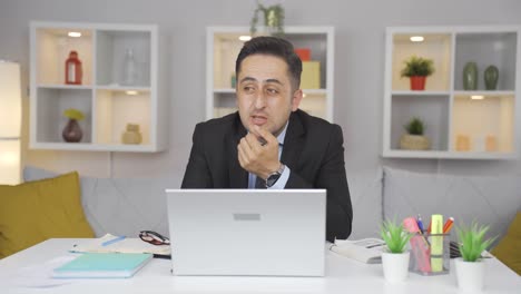 home office worker man thinking about private life problems.