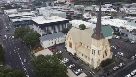 : drone spinning around the church on a cloudy day