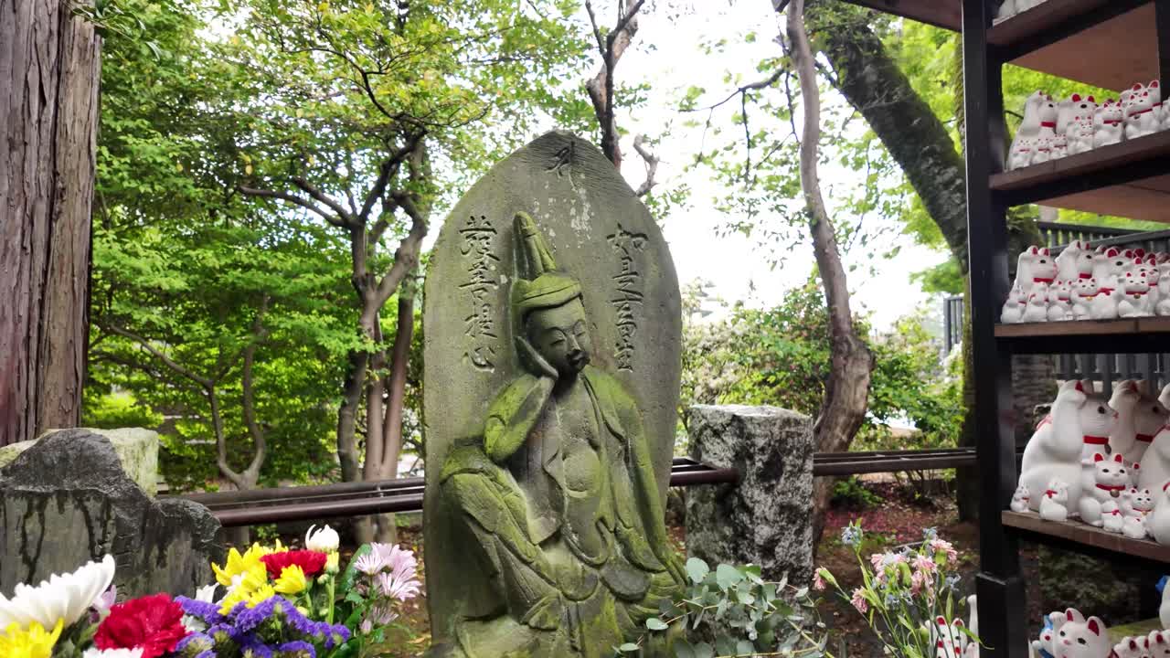 Japanese Jizo statue shrine ancient protector roadside worship religion Japan