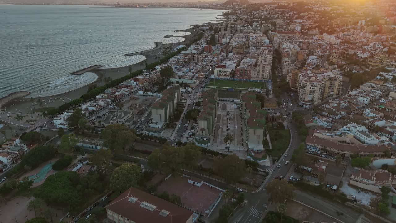 Malaga from an aerial view. City with beautiful resorts with beaches. Sunset in Spain