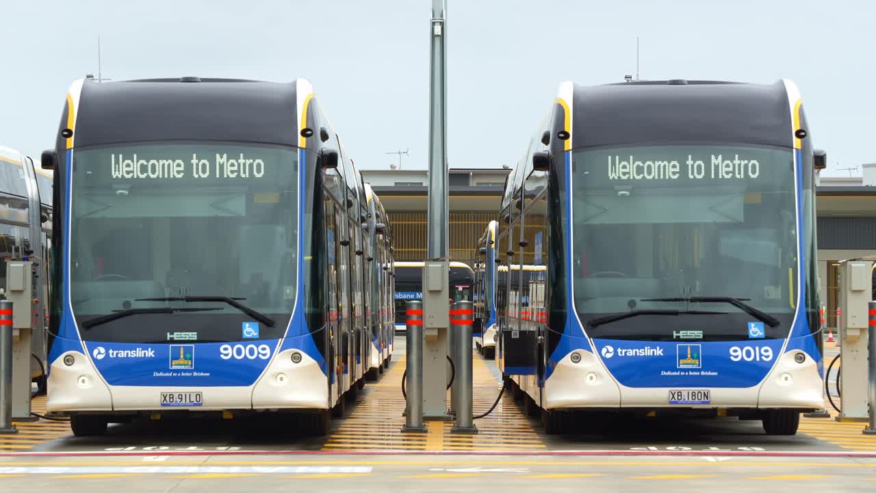 Two Translink Electric Buses Charging at a Depot in Brisbane