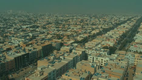 aerial over dha defence karachi in pakistan. follow shot