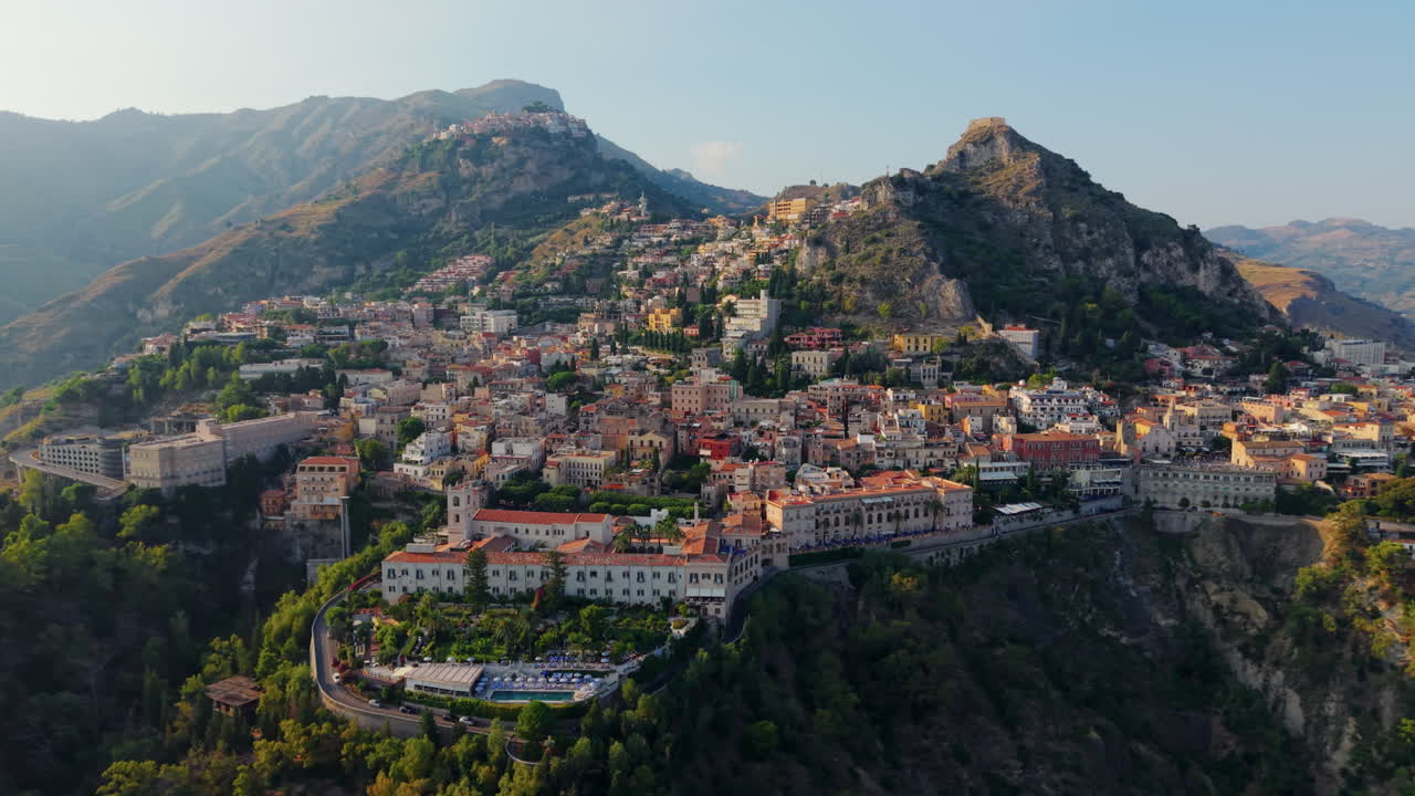 Aerial view of Taormina with mountains in Sicily, Italy