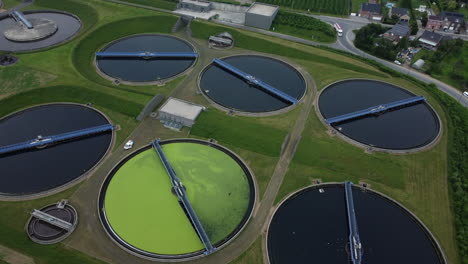 aerial view of wastewater treatment plant with algae