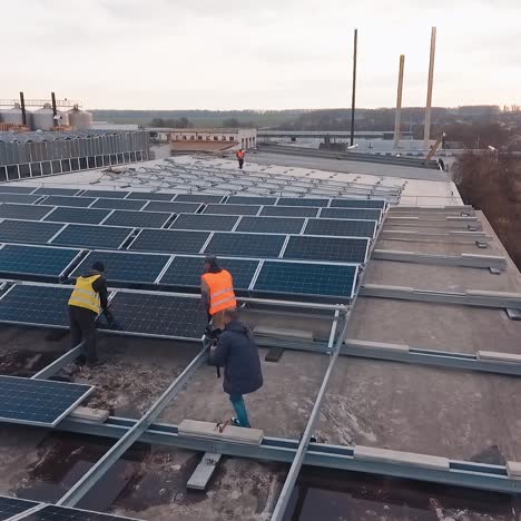 Solar cells on factory rooftop. Architectural detail of panels roofing on commercial construction