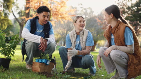 group of volunteers planting trees and smiling together