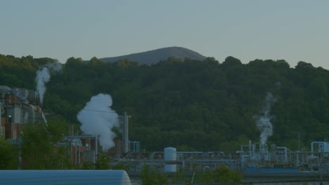 celanese factory releasing white vapors into the atmosphere - chemical pollution