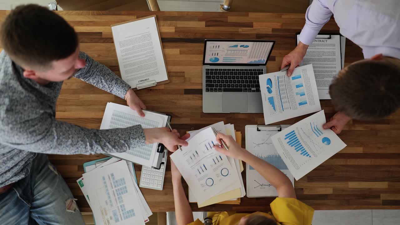 Business meeting with data analysis and teamwork