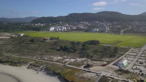 Aerial-orbit-relaxing-view-of-portuguese-northern-beach-of-Afife,-Viana-do-Castelo,-Portugal