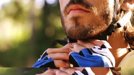 Close-up-of-male-mountain-biker-wearing-helmet