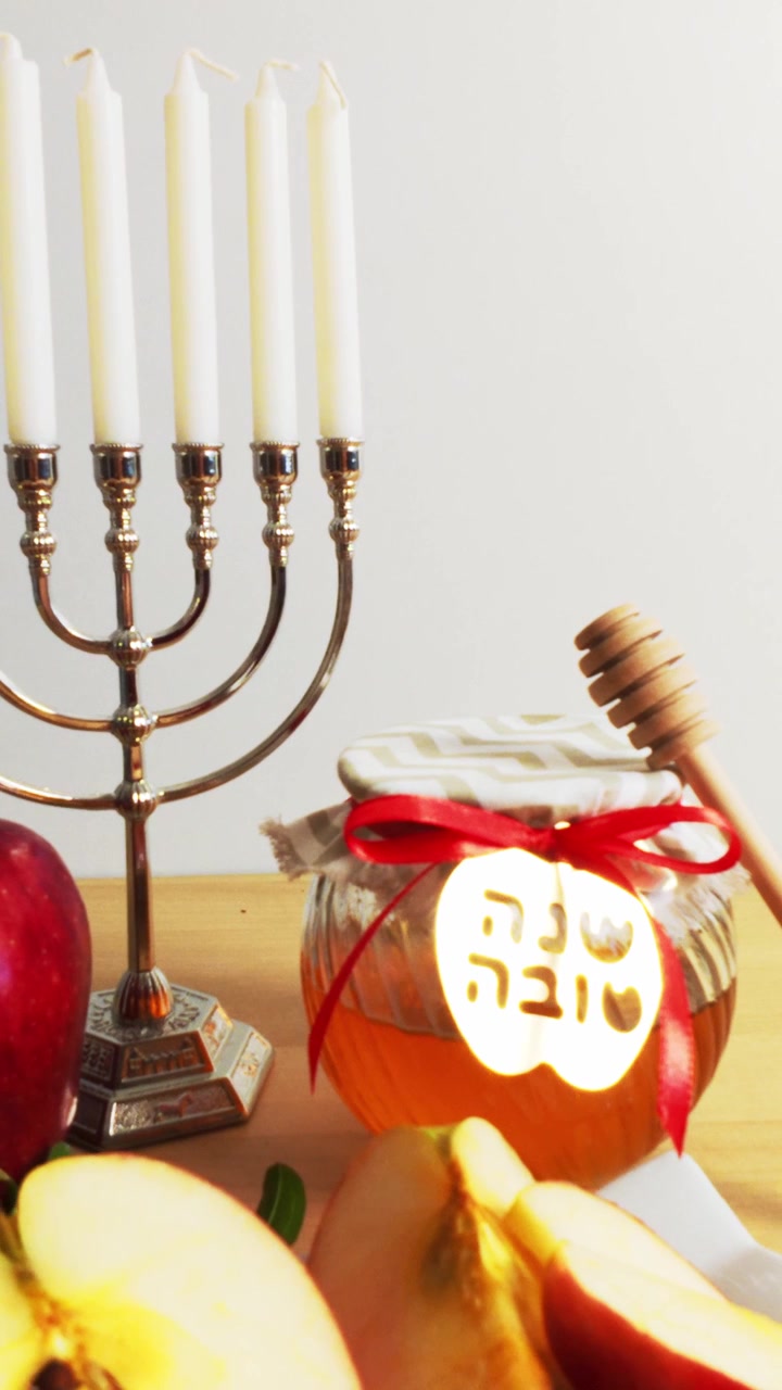 Rosh hashanah table with honey apple and pomegranate