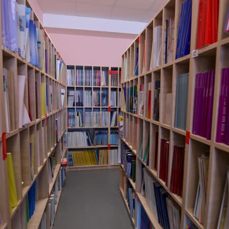 modern bookstore. educational literature stacked on shelves for students in the library. wooden bookcases with many books indoors