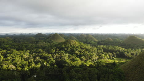 beautiful sunset light over the chocolate hills in the philippines