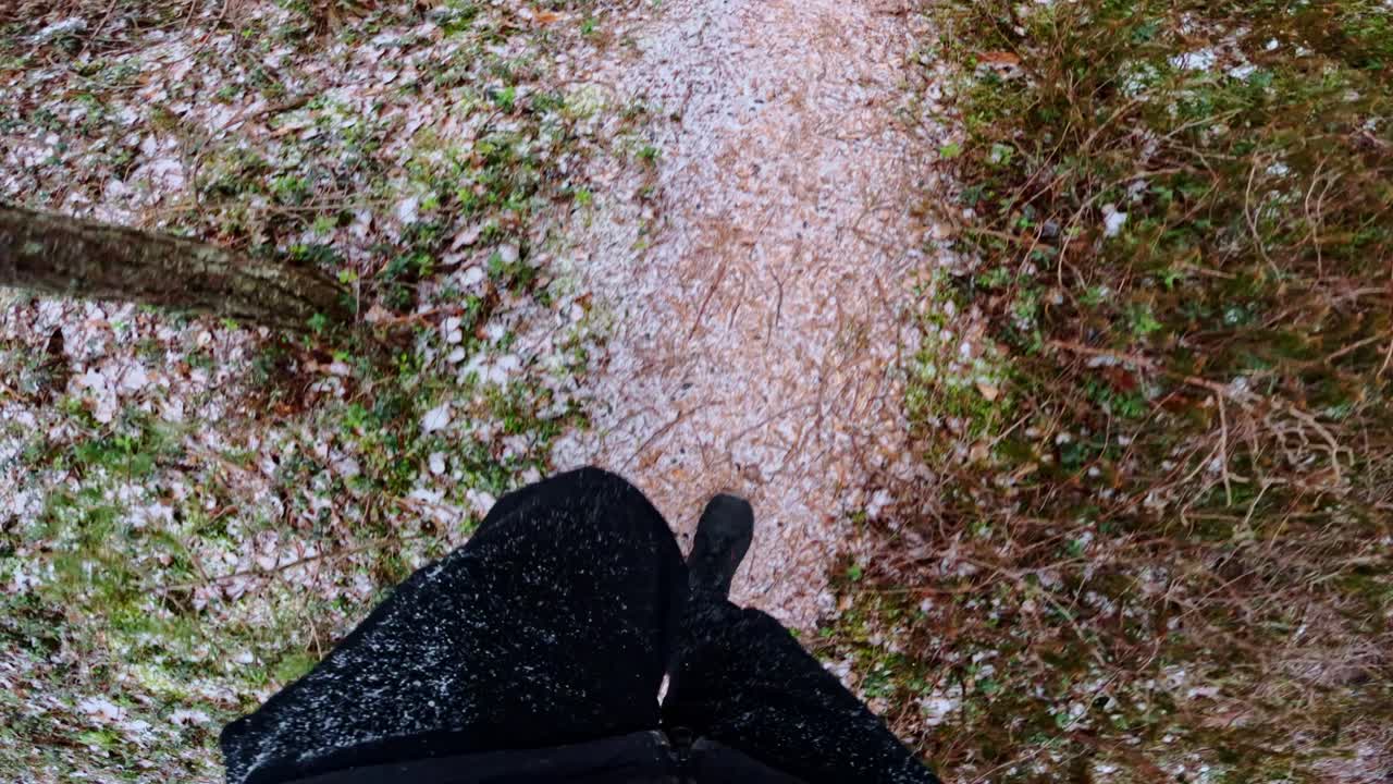Man captures snowy Latvian swamp walk on action camera, cold light and frost