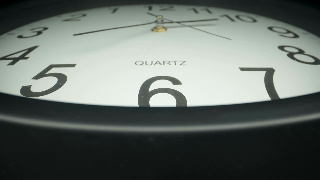 Closer look of the second hand of the wall clock