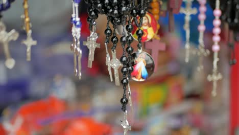 christian ornaments, hanging at showcase exhibition for sale market, festive atmosphere and religious holidays concept