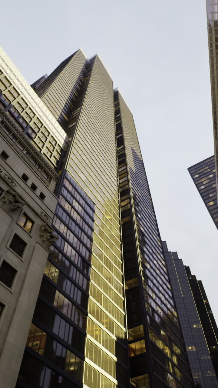 Exploring the towering skyscrapers of urban architecture at dusk