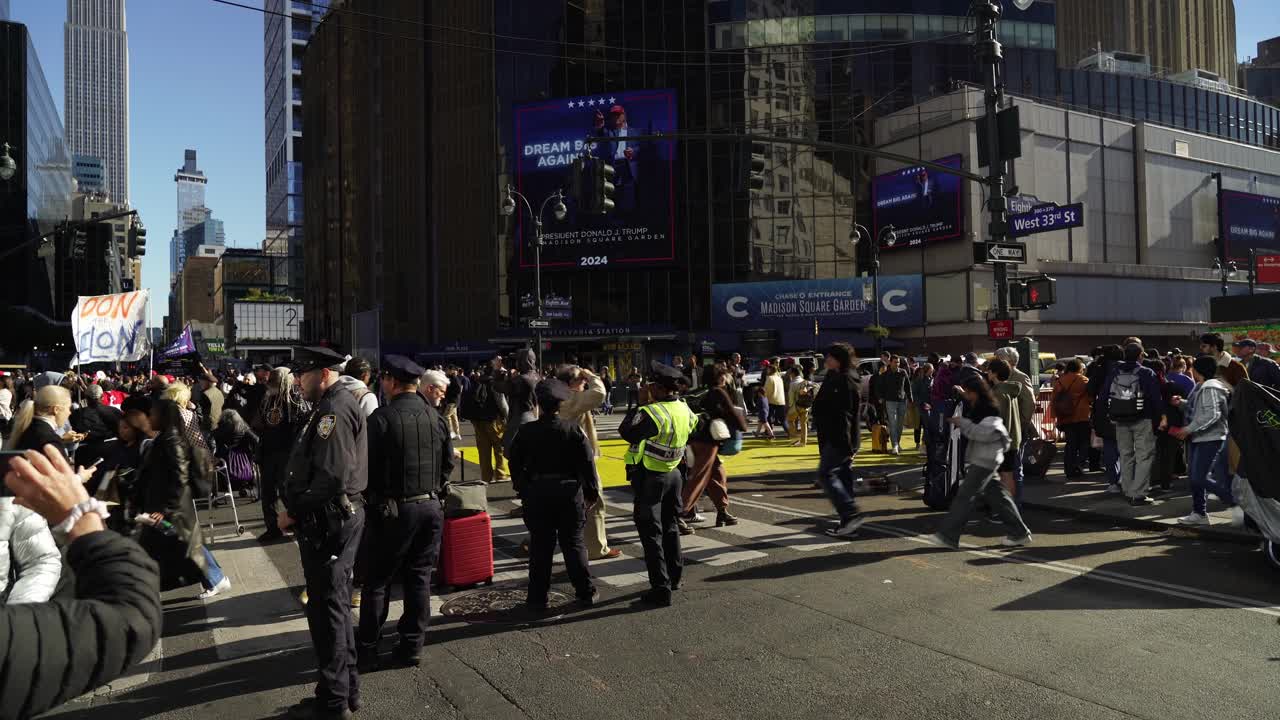Trump’s supporters pack the streets around Madison Square Garden, the sunlight casting a warm glow over the bustling crowd