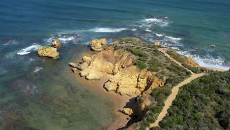 aerial tilt down over torquay’s rocky point lookout, australia