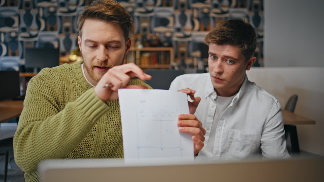 Inspired creators videocalling computer at office closeup. Team video chatting