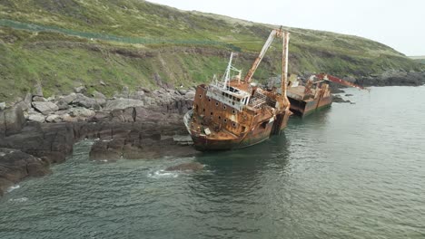 mv alta shipwreck split in half washed ashore in the coastline of ballycotton in ireland