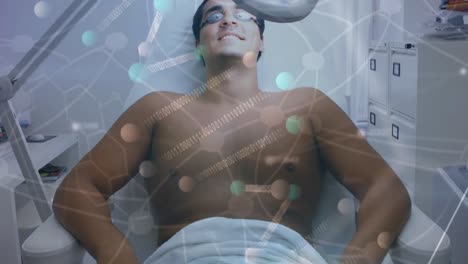 animation of molecules and dna over biracial male patient during beauty treatment